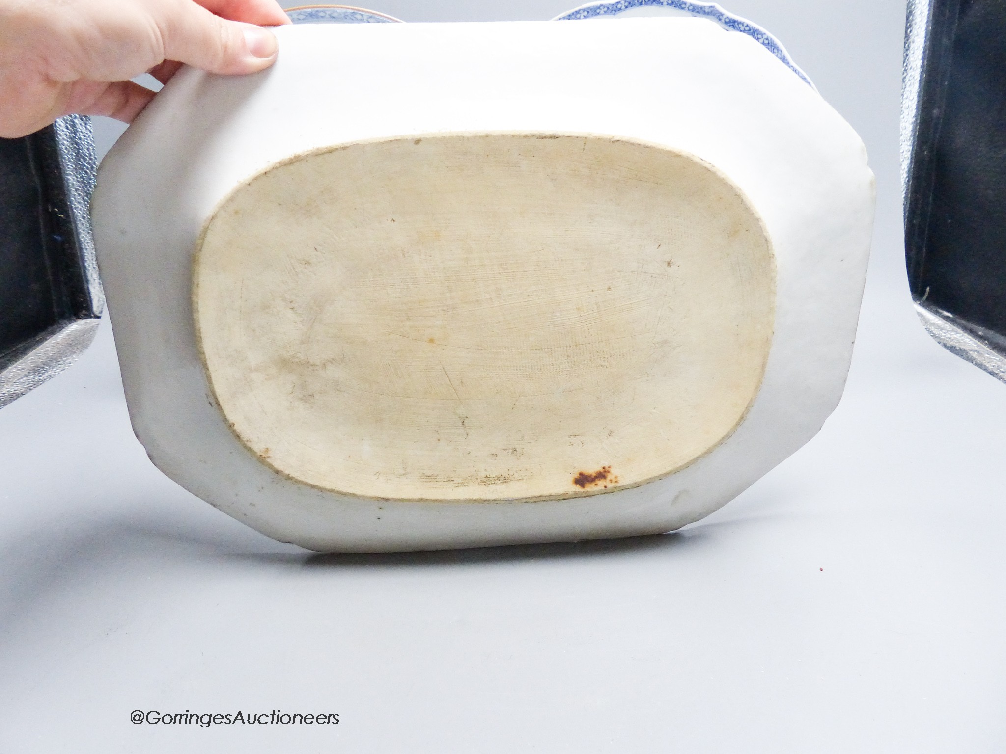 Two 18th century Chinese circular export plates and two canted rectangular dishes, 32 x 23cm